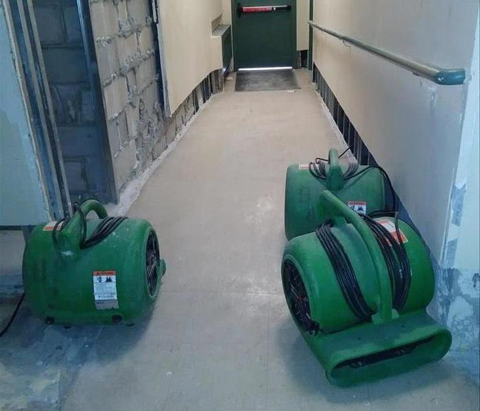 air movers in a hallway